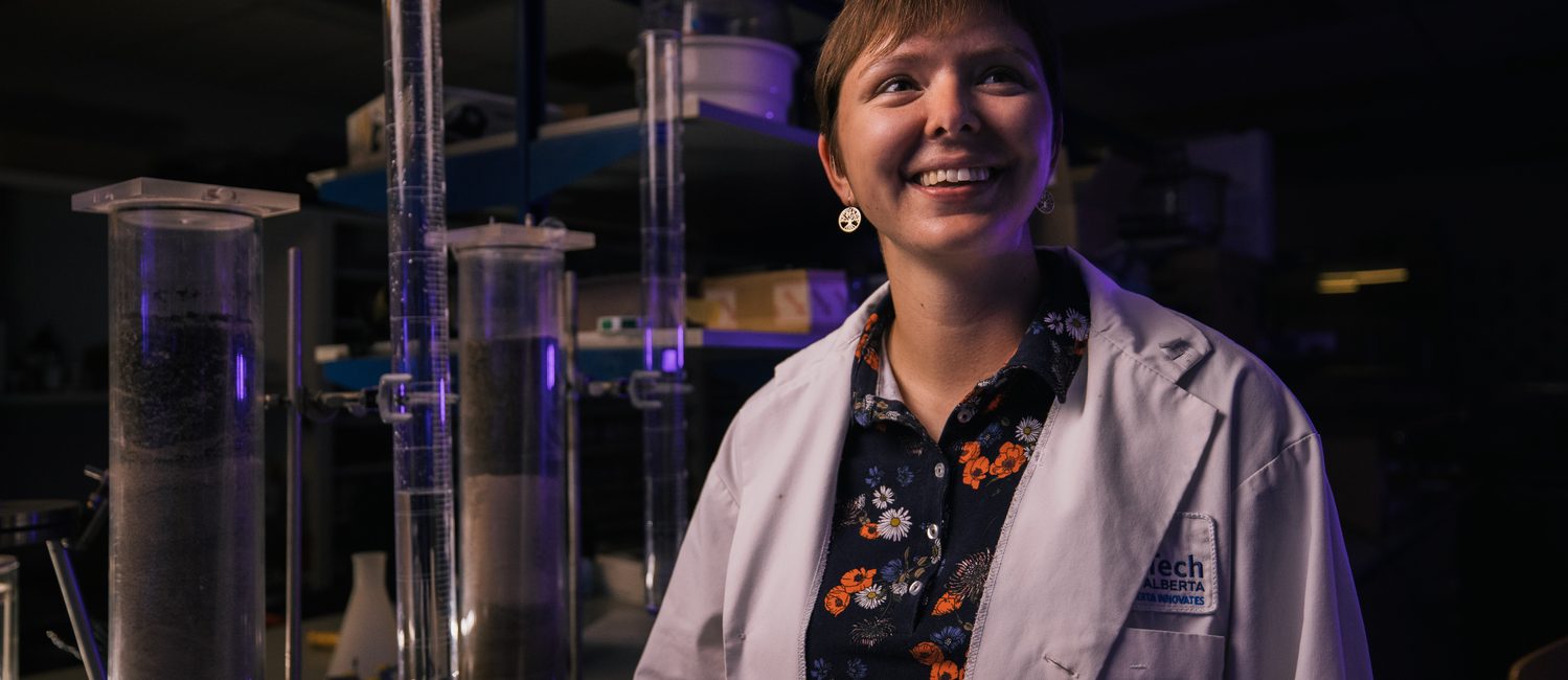 Smiling woman in labcoat