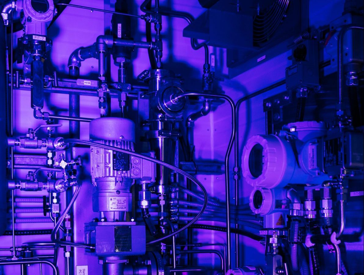 Aesthetic image of pipes in a purple hue.