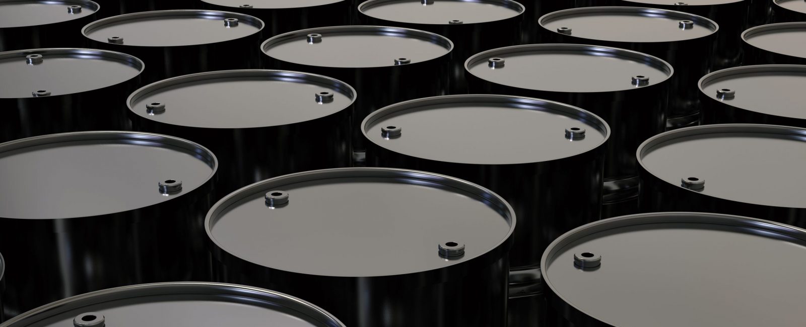 Aesthetic image of black oil barrels.