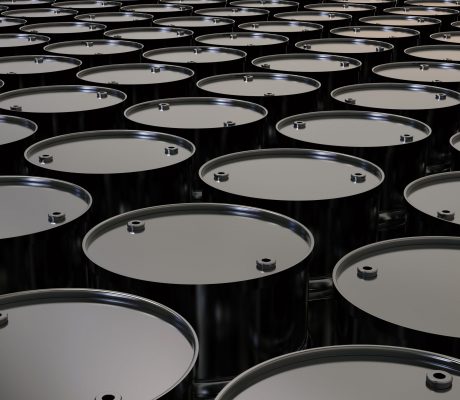 Aesthetic image of black oil barrels.